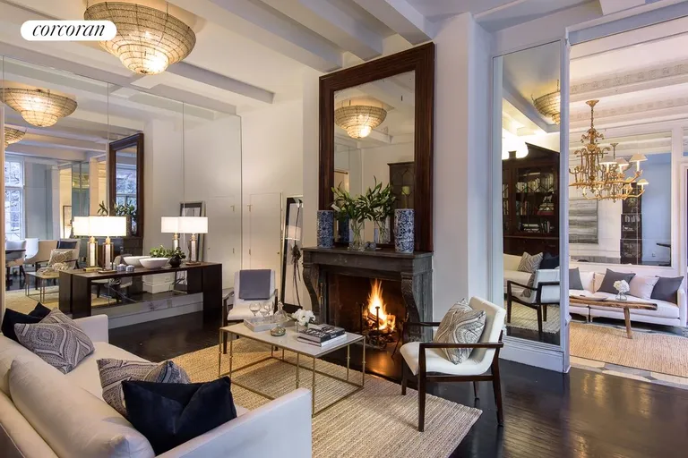 New York City Real Estate | View 170 East 78th Street, 2A-3B | Living Room with Wood Burning Fireplace | View 2