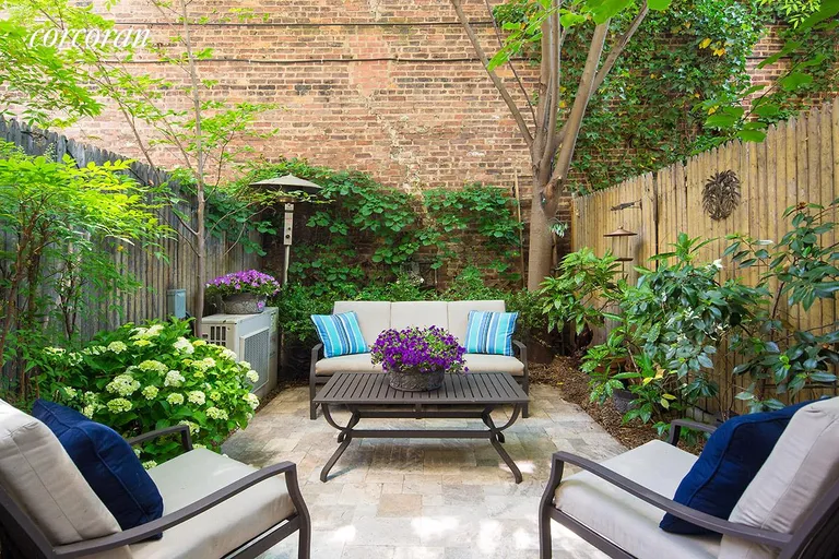 New York City Real Estate | View 92 Horatio Street, 1L | Private outdoor garden with stone patio | View 2