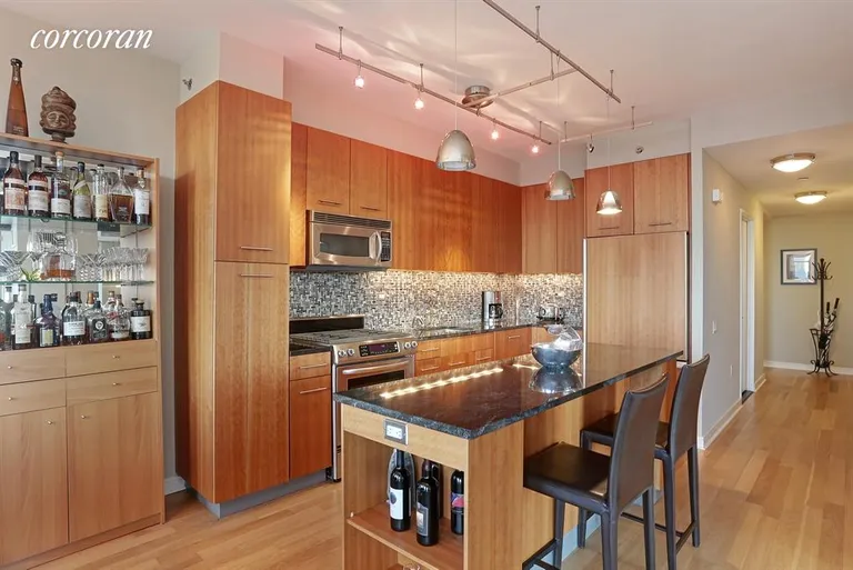 New York City Real Estate | View 11 East 29th Street, 32A | Open Kitchen w/wood cabinetry, new counter/bksplas | View 3