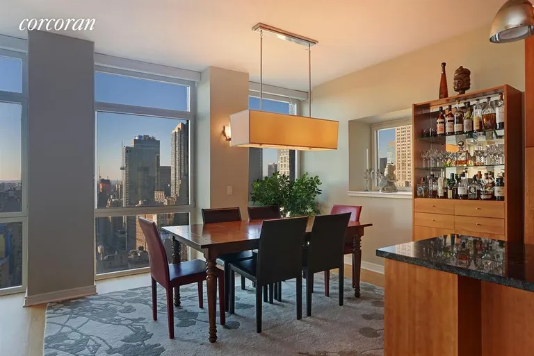 New York City Real Estate | View 11 East 29th Street, 32A | Dining with serene views from spacious Dining Area | View 5