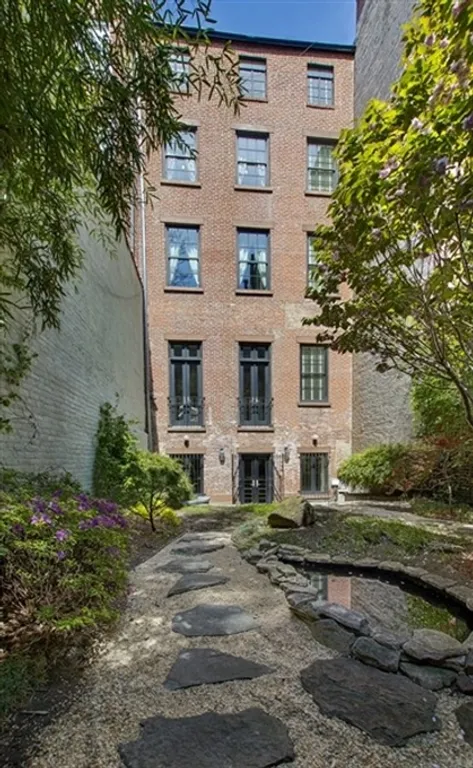 New York City Real Estate | View 60 West 9th Street | Rear view from South Garden | View 12