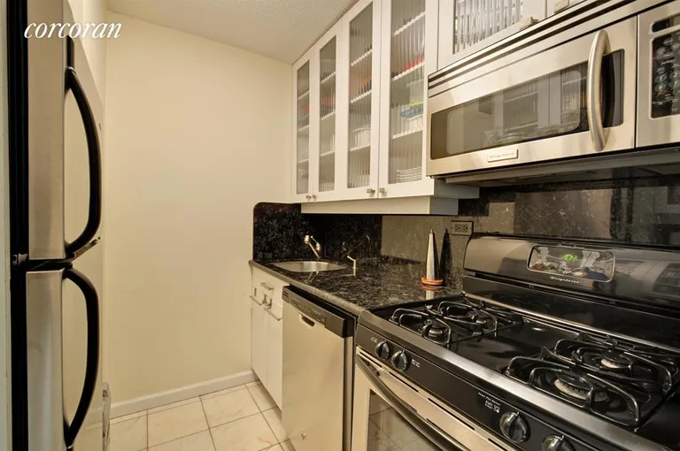 New York City Real Estate | View 301 East 79th Street, 26S | Renovated Kitchen Stainless appliances   | View 3