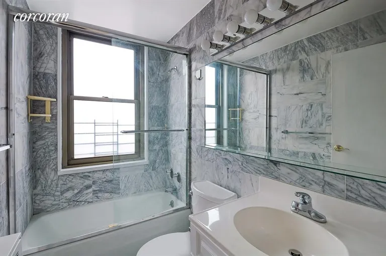 New York City Real Estate | View 301 East 79th Street, 30B | Marble Windowed 2nd Bath | View 7
