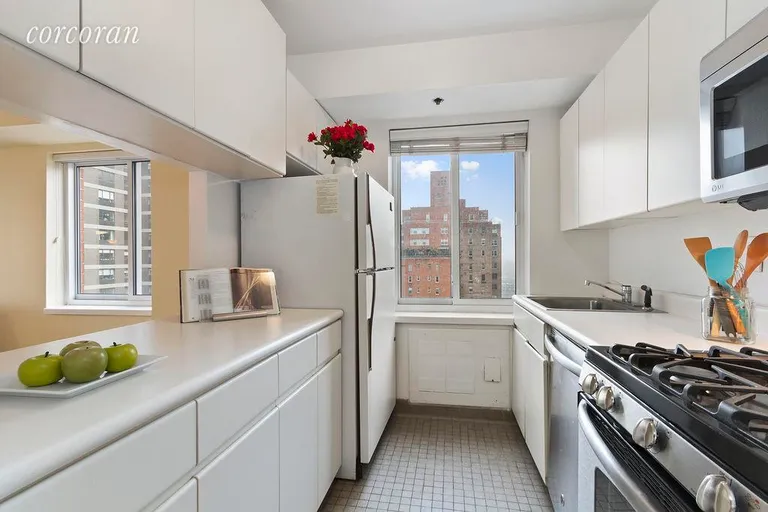 New York City Real Estate | View 420 East 58th Street, 17A | Windowed kitchen facing east | View 4