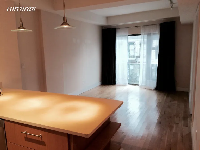New York City Real Estate | View 117 East 102nd Street, PHA | Spacious living room with 9 foot ceilings | View 4