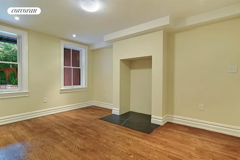 New York City Real Estate | View 126 Hancock Street, 1 | Master bedroom with patio views | View 3