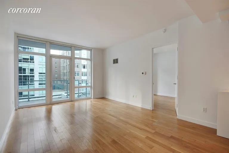 New York City Real Estate | View 555 West 59th Street, 5G | 21 x 13 Living Room with floor to ceiling windows | View 5