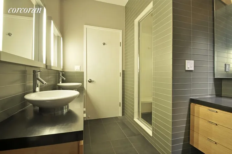 New York City Real Estate | View 257 West 17th Street, 6B | Spa Bathroom with Dual Sinks | View 5
