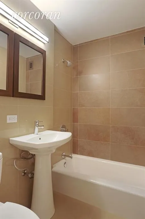 New York City Real Estate | View 77 West 55th Street, 8B | Bathroom | View 7