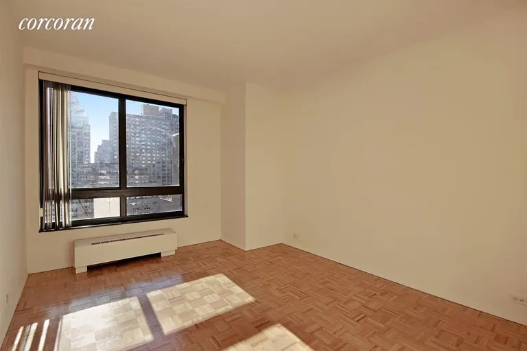 New York City Real Estate | View 100 United Nations Plaza, 21D | Bedroom with Over Sized Windows - 9 Foot Ceilings | View 2