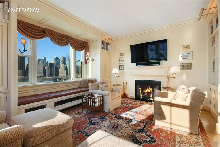 New York City Real Estate | View 1 Pierrepont Street, 9A | Library with stunning views and fireplace | View 3