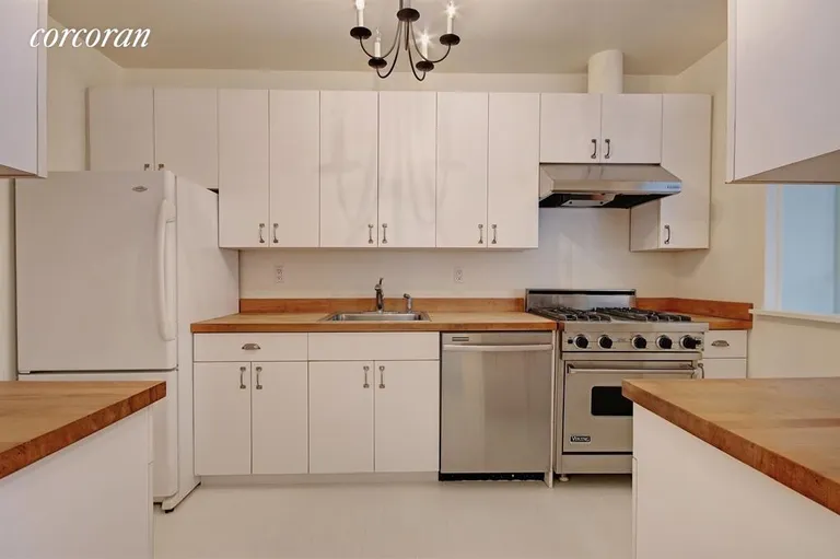 New York City Real Estate | View 7 East 81st Street, 4 | Kitchen with butcher block counter tops | View 2
