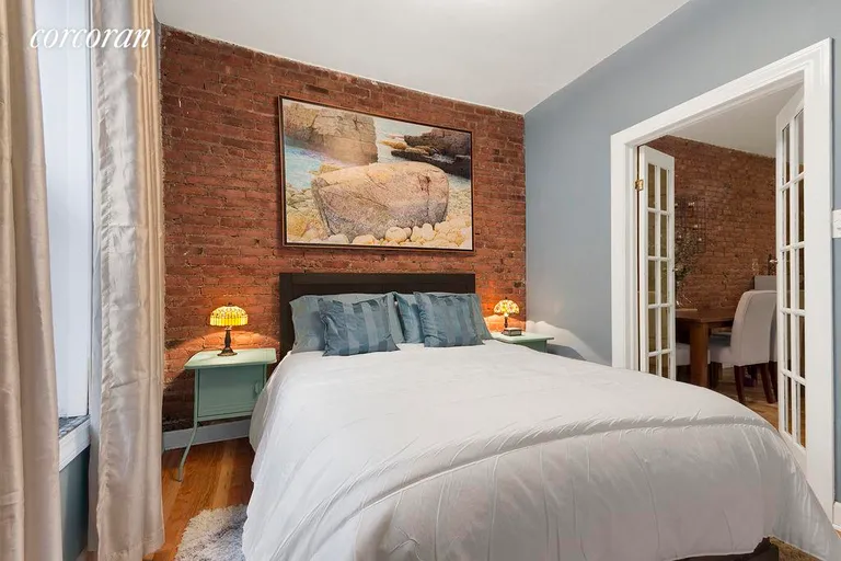 New York City Real Estate | View 411 15th Street, D | Master Bedroom with Exposed Brick | View 3