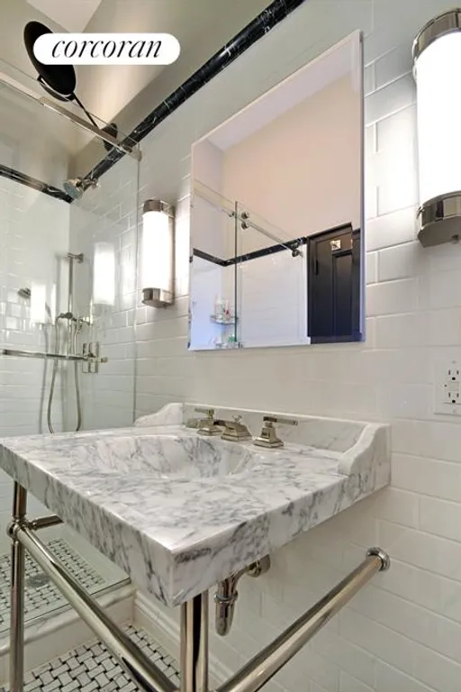 New York City Real Estate | View 11 West 81st Street, 1B | Exquisitely renovated windowed marble bathroom  | View 3
