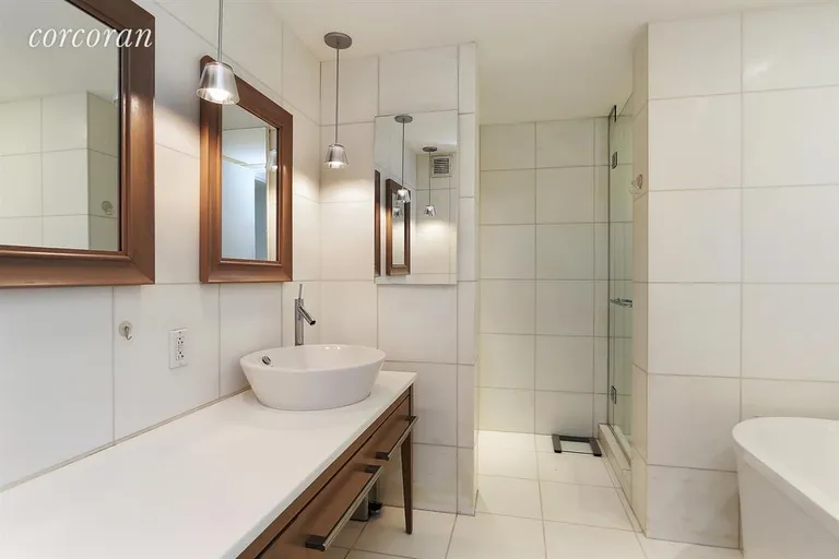New York City Real Estate | View 340 East 23rd Street, 8F | Huge Spa Like Bathroom with excellent storage | View 4