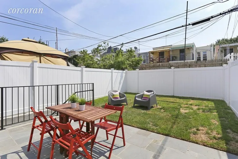 New York City Real Estate | View 182 13th Street, 1 | Back yard with patio and retractable awning | View 10