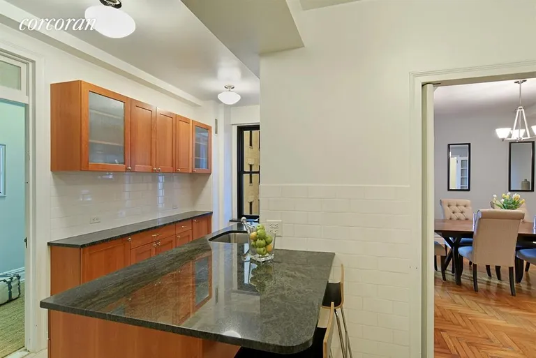 New York City Real Estate | View 135 Eastern Parkway, 6E | Extra dining at breakfast bar... | View 6