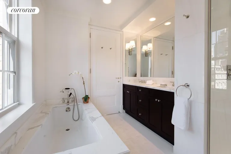 New York City Real Estate | View 40 East 66th Street, 6B | Windowed Marble Master Bathroom  | View 6