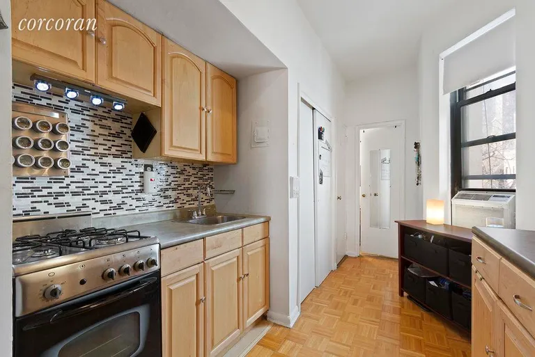 New York City Real Estate | View 512 East 83rd Street, 4A | 2 Kitchen Area with Window | View 2