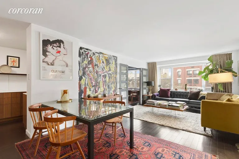 New York City Real Estate | View 2 Charlton Street, 6J | Dining area next to kitchen & huge living room | View 2