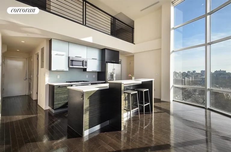 New York City Real Estate | View 524 Manhattan Avenue, 7 | Kitchen with mezzanine loft above | View 9
