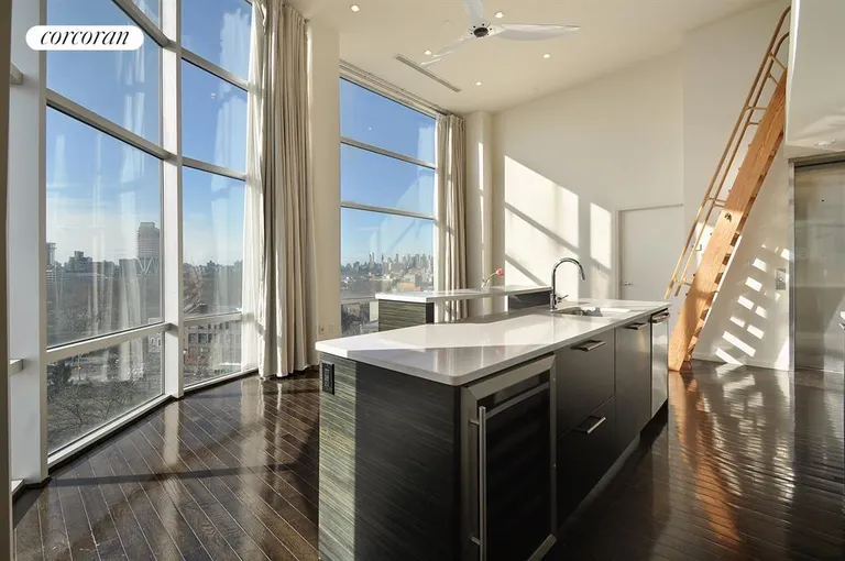 New York City Real Estate | View 524 Manhattan Avenue, 7 | Kitchen / Living Room with ladder to mezzanine | View 10