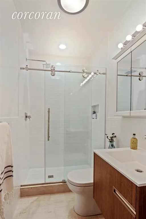 New York City Real Estate | View 302 5th Avenue, 1R | Master Bathroom | View 9