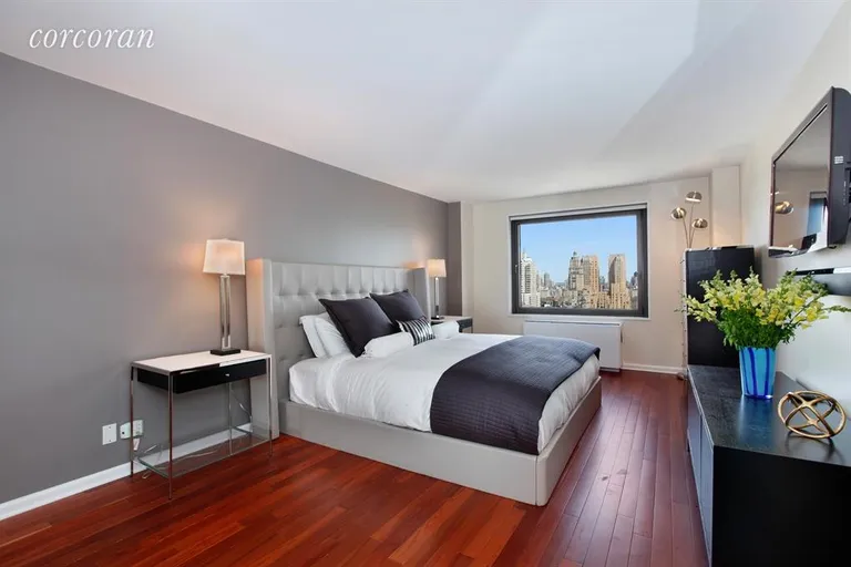 New York City Real Estate | View 201 West 70th Street, 30F | Large master bedroom.  | View 4