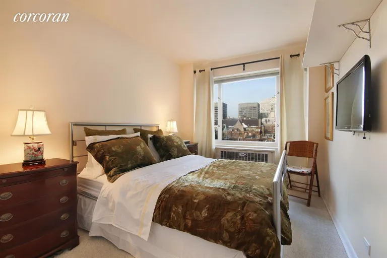 New York City Real Estate | View 166 East 63rd Street, 10D | Lovely Bedroom with Open City Views | View 3