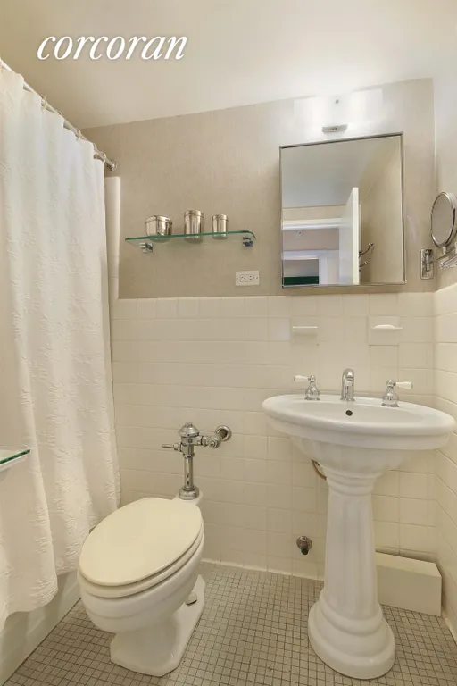New York City Real Estate | View 166 East 63rd Street, 10D | Renovated Bath | View 4