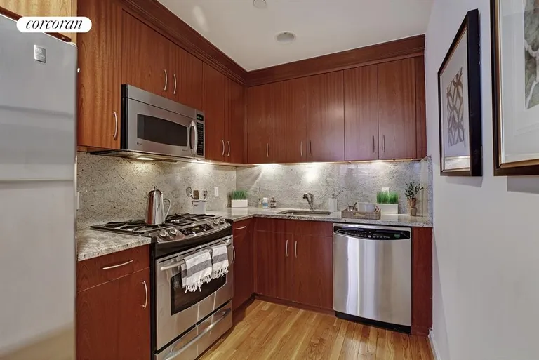 New York City Real Estate | View 556 State Street, 2DN | Chef's kitchen with stainless appliances | View 4