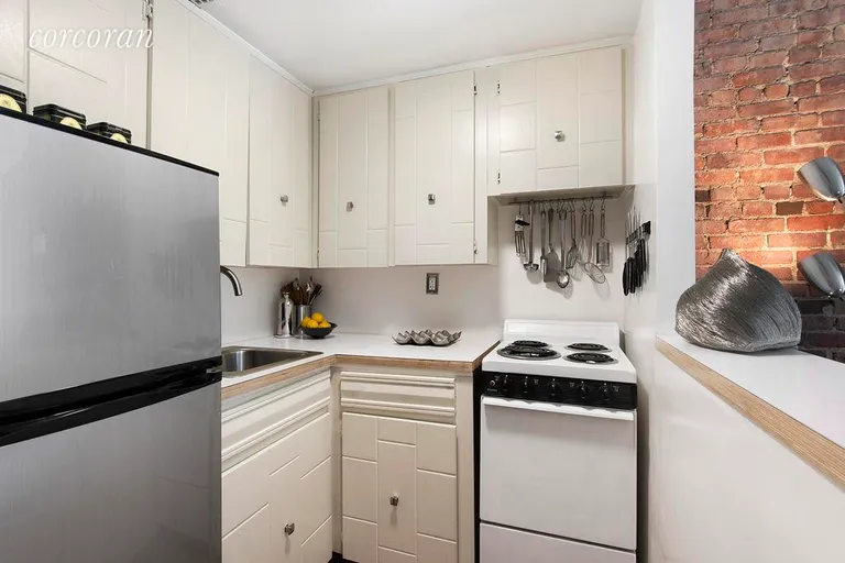 New York City Real Estate | View 356 West 23rd Street, 3B | Pass through kitchen | View 4