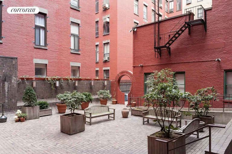 New York City Real Estate | View 23 Waverly Place, 4I | Entrance is through a romantic courtyard  | View 6