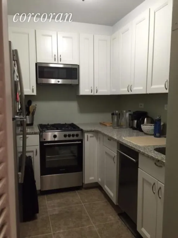 New York City Real Estate | View 77 East 12th Street, 15A | New Kitchen with Dishwasher | View 7