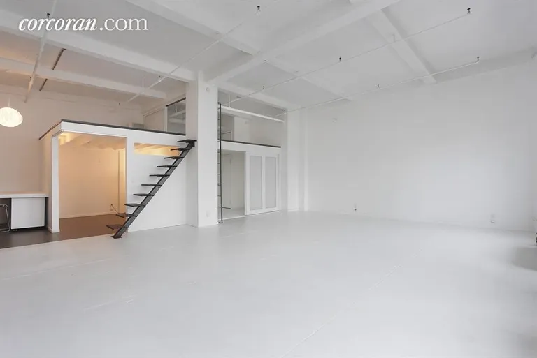 New York City Real Estate | View 448 West 37th Street, PH/B | With view of entry and mezzanine. | View 3