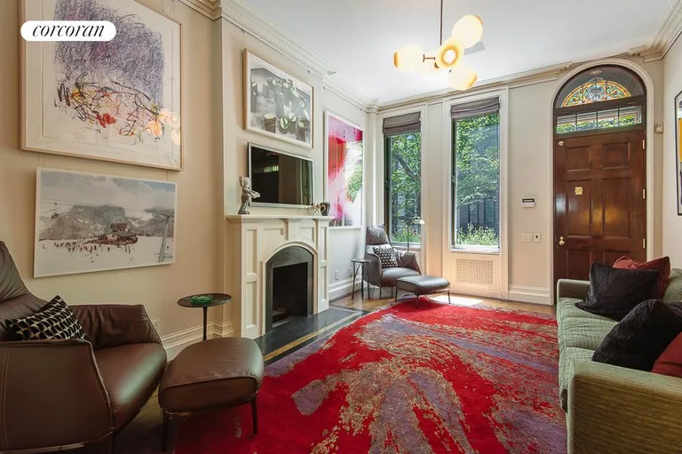 New York City Real Estate | View 137 West 87th Street | Living Room with Wood Burning Fireplace | View 3