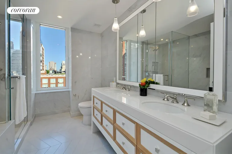 New York City Real Estate | View 212 Warren Street, 17C | Windowed Master bath with soaking tub | View 9