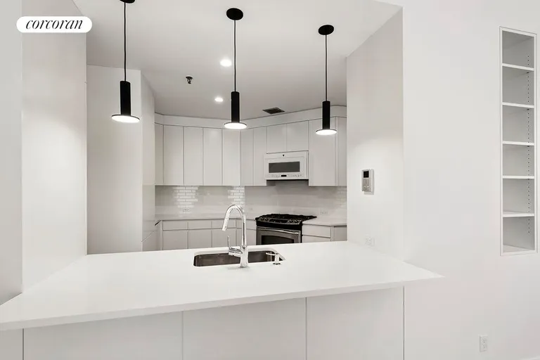 New York City Real Estate | View 181 Hudson Street, 5A | Sleek, open kitchen. New appliances. Wine fridge.  | View 2