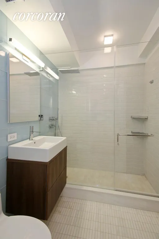 New York City Real Estate | View 211 East 51st Street, 3C | Renovated Bath | View 4