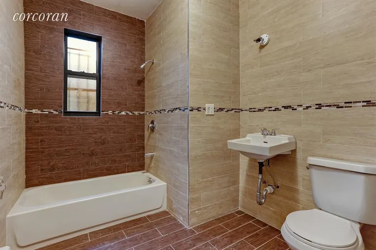 New York City Real Estate | View 1495 Lincoln Place | First Floor Bathroom | View 7