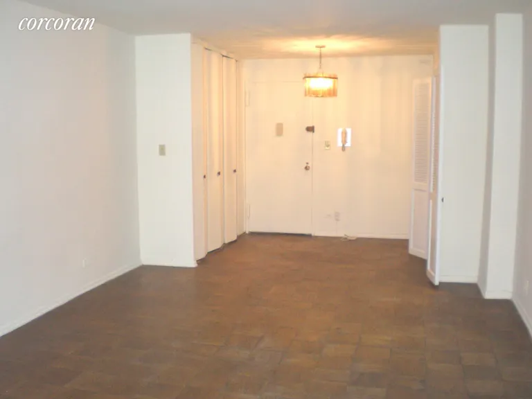 New York City Real Estate | View 305 East 40th Street, 16H | 16H-Living Room and Foyer | View 2