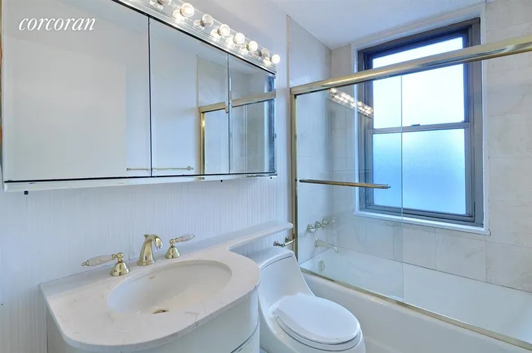 New York City Real Estate | View 301 East 79th Street, 18F | windowed Marble Bath | View 4