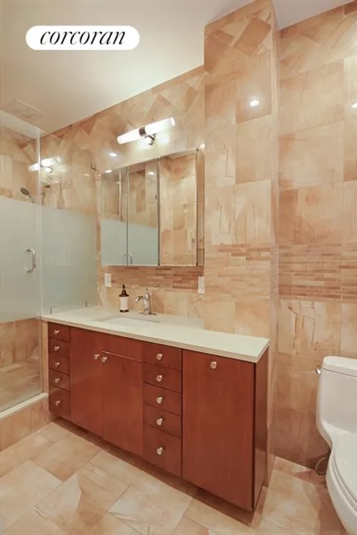 New York City Real Estate | View 240 West 98th Street, 3G | Master bathroom with spa-like shower | View 5