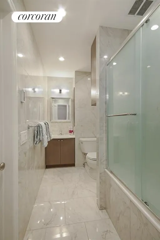 New York City Real Estate | View 240 West 98th Street, 3G | Second full bathroom with radiant heat floors | View 6
