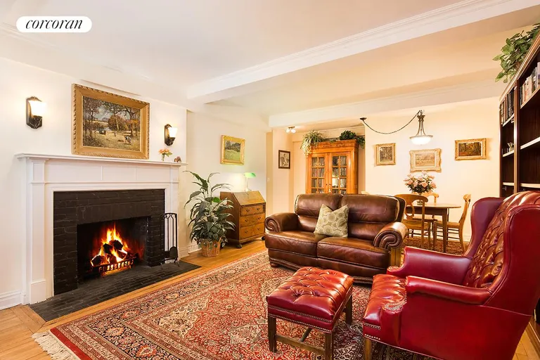 New York City Real Estate | View 414 East 52Nd Street, 3EF | Large den with wood-burning fireplace | View 2