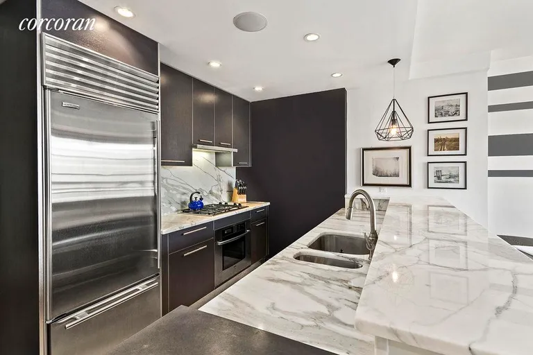 New York City Real Estate | View 527 Court Street, 3B | Cook's kitchen opens to living area. | View 2