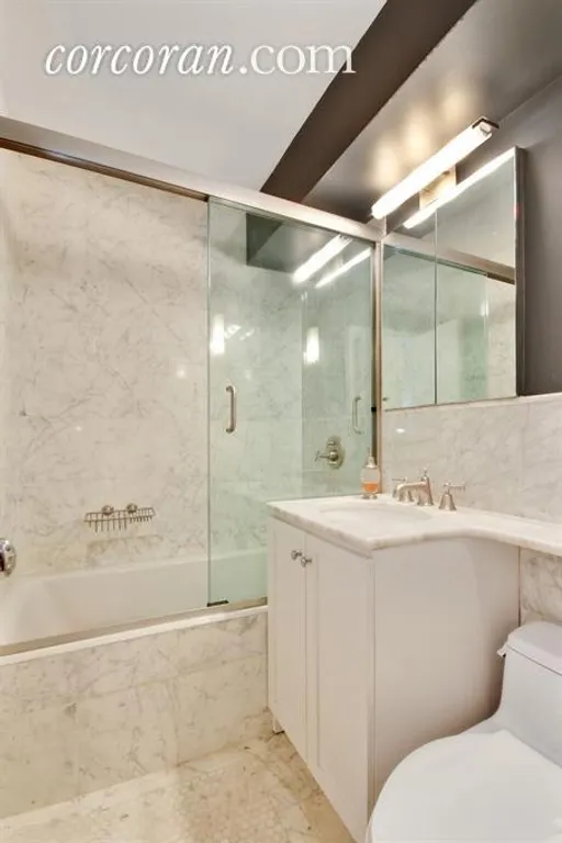 New York City Real Estate | View 174 East 74th Street, 4FG | Marble Bath  | View 6