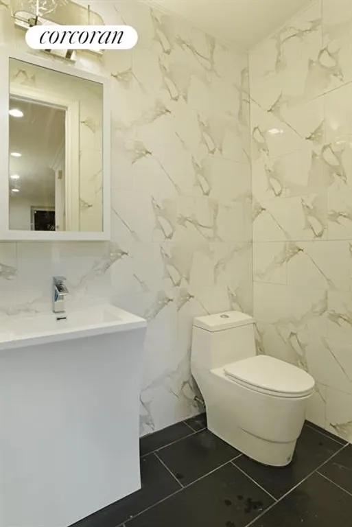 New York City Real Estate | View 12 Louis Place | Bathroom | View 12