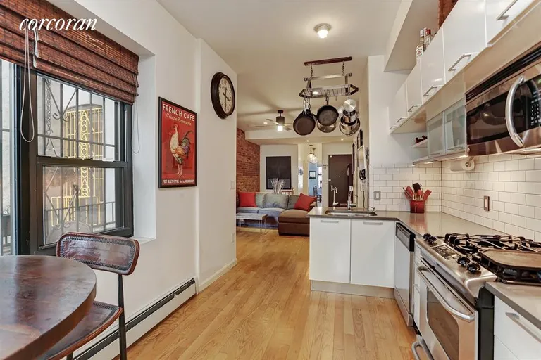 New York City Real Estate | View 1060 Putnam Avenue, 1R | Open windowed kitchen  | View 2
