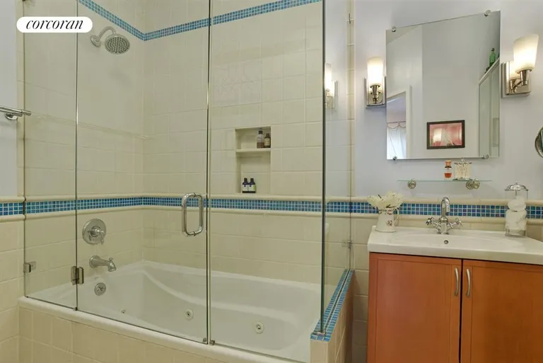 New York City Real Estate | View 101 8th Avenue, 9 | Master Bathroom with Jacuzzi Bathtub | View 8